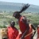Masai warriors display strength in a welcome a dance